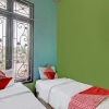 Отель OYO 92872 Swakarya Guest House, фото 6