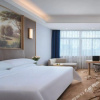 Отель Vienna International Hotel (Poyang Wetland Park), фото 4