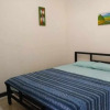 Отель OYO 93747 Balekui Homestay, фото 3