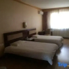 Отель Dongxin Hotel (Shihezi No.12 Residential Area), фото 1