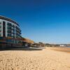 Отель The Sands - Sea Front Apartments, фото 1