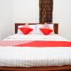 Отель Pondok Mulia Guest House by OYO Rooms, фото 11