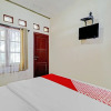 Отель Collection O 90461 Graha Atmadja Syariah Guest House, фото 4