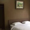 Отель Villa Fahim 1 Puncak 4 Bedroom, фото 4