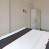 Отель OYO Capital O 91631 M-square Apartement, фото 7