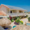 Отель Huge 4-bedroom Apartment 2 km From Eagle Beach, фото 18