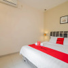 Отель RedDoorz near Transmart Kalimalang, фото 4