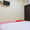 Отель OYO 1681 The Kost Tdm 2, фото 16