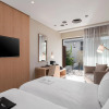 Отель Ikones Seafront Luxury Suites - Adults Only, фото 3