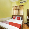 Отель OYO 91036 Hotel Simpang Lima Gkpri, фото 7