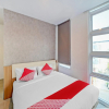 Отель Super OYO 90559 Gamacity Residence, фото 1