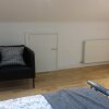 Отель Coulsdon Place Apartments в Лондоне