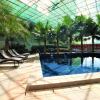 Отель ZEN Rooms Sunshine City Suites, фото 5