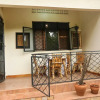 Отель Remarkable 2-bed Cottage Along Gayaza Road, фото 9