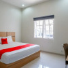 Отель RedDoorz Syariah near Mutiara SIS Al Jufrie Airport Palu 2, фото 4