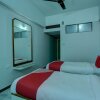 Отель OYO 24579 Flagship Hotel Padmam, фото 3