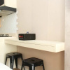 Отель New and Cozy Studio at Patraland Urbano Apartment, фото 11