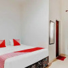 Отель OYO 90674 Wisma Syukran Syariah, фото 6
