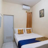 Отель Spot On 3988 Kost Carmelia Baranangsiang Syariah, фото 7