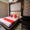 Отель OYO 12842 Hotel Sumit Lodge, фото 3