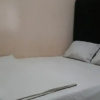 Отель OYO 90706 Kost Alam Jaya Syariah, фото 17