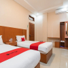 Отель Reddoorz Syariah Near Rs Mata Padang, фото 5