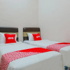 Отель OYO 1595 Javas Guest House, фото 6