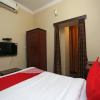 Отель OYO 19310 Flagship Jingle Inn, фото 4