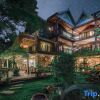 Отель Hidden Garden Inn в Цзинхуне