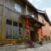 Отель Lijiang Sancunriguang Inn, фото 1
