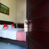 Отель Wisma Fahza by OYO Rooms, фото 8