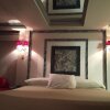 Отель Wildwood Inn Tropical Dome & Theme Suites, фото 16