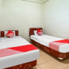 Отель OYO Life 91160 Wisma Srijaya Syariah, фото 7