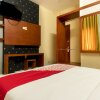 Отель Capital O 615 Residence Puri Hotel Syariah, фото 12