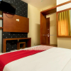 Отель Capital O 615 Residence Puri Hotel Syariah, фото 12