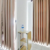 Отель Homey And Nice Studio At Akasa Pure Living Bsd Apartment, фото 2