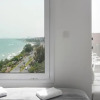 Отель The White Pearl Suite - beach front city centre with sea view., фото 15