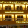 Отель Yellow Mansion Hotel Banda Kaba, фото 1