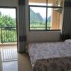 Отель Yangshuo Jinyue Inn, фото 3