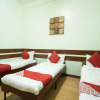 Отель Oyo 130 Jy Crown Palace, фото 3