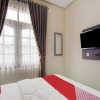 Отель OYO 90175 Tl Guest House, фото 3
