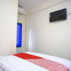 Отель MIM Guest House Syariah by OYO Rooms, фото 7