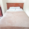 Отель Triyoga Homestay Syariah Redpartner, фото 2