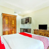 Отель Fajar Guest House by OYO Rooms, фото 11