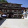 Отель Daocheng Drolma's Guest House, фото 1