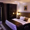 Отель E-Suite Hotel в Абудже