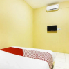 Отель OYO 90900 Pagi Sore Residence, фото 11