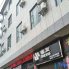 Отель Heqing Yiyuan Business Hotel, фото 1