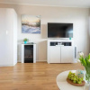 Отель Haus-Steinwarder-7-Wohnung-Strandbude-14, фото 12