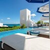 Отель Long Bay Villas - Villa Sky, фото 22